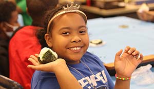 Girl holding Onigiri,